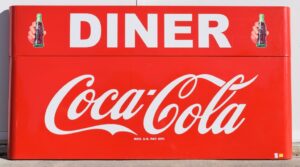Red Coca Cola Metal Sled Sign With Diner Privilege Panel