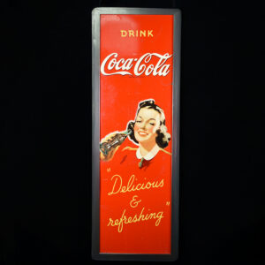 Framed 1940s Coca-Cola Masonite Vertical Sign With Betty Graphic